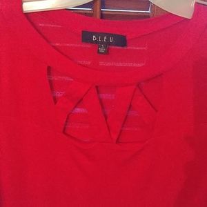 Red peek a boo top long top